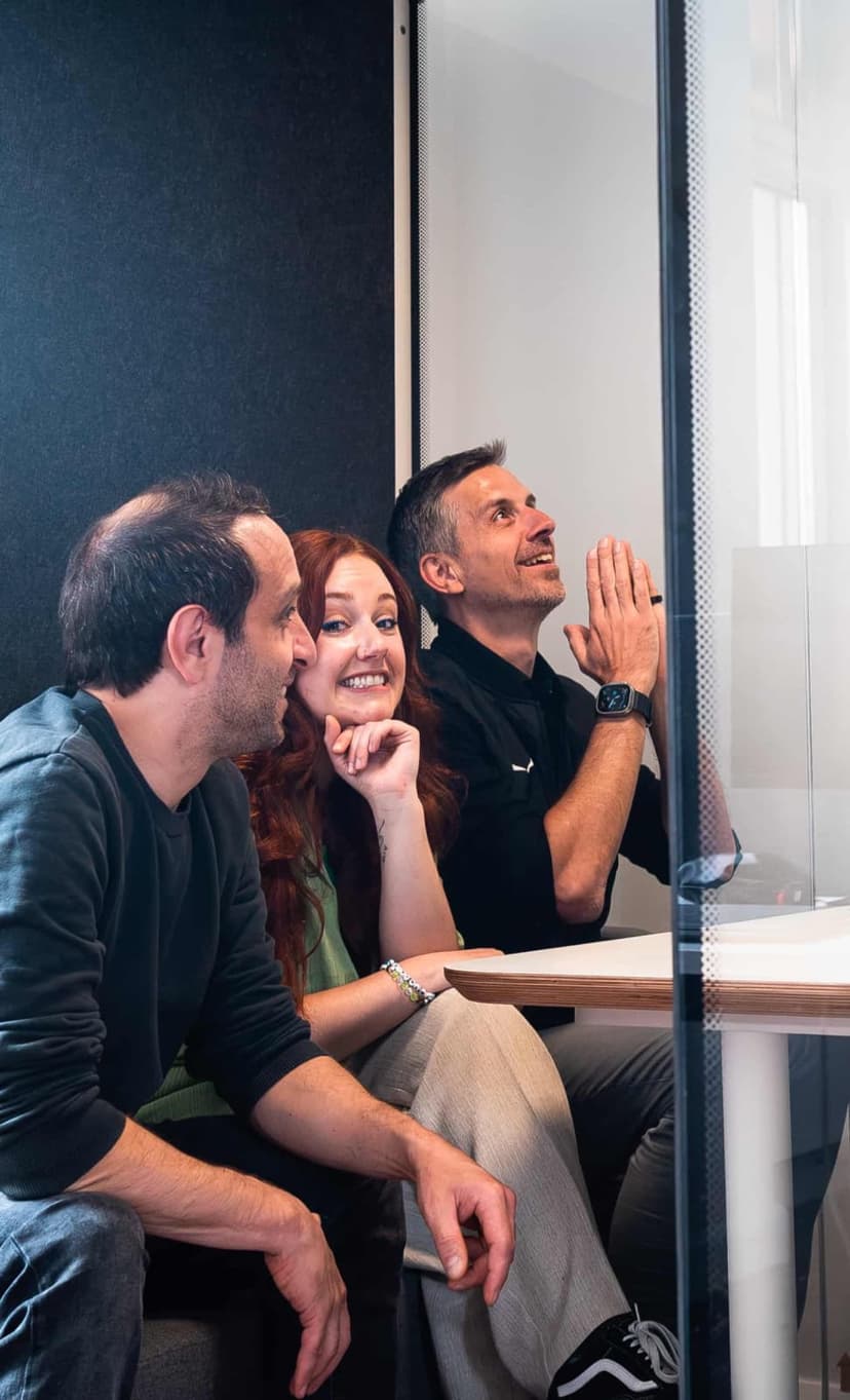 3 team members meeting up in one of our soundproof office pods