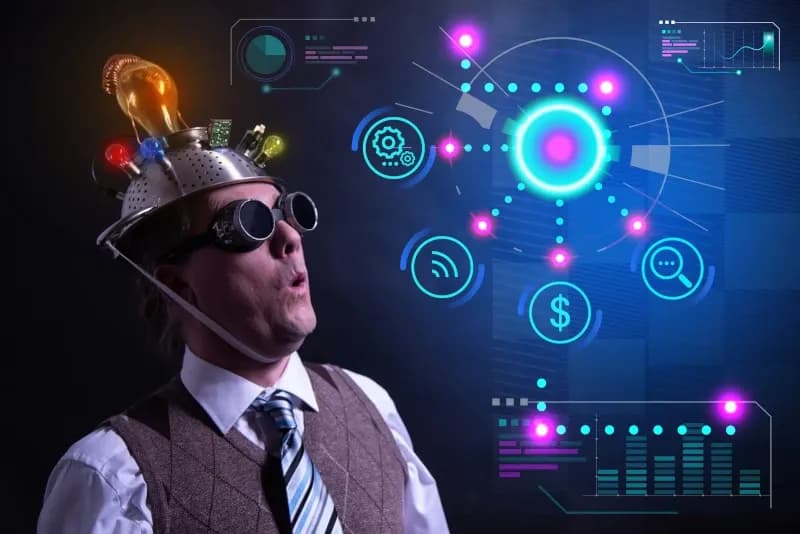 Mann mit Partyhut und dem Blick in eine grafisch abstrakte Darstellung von KI